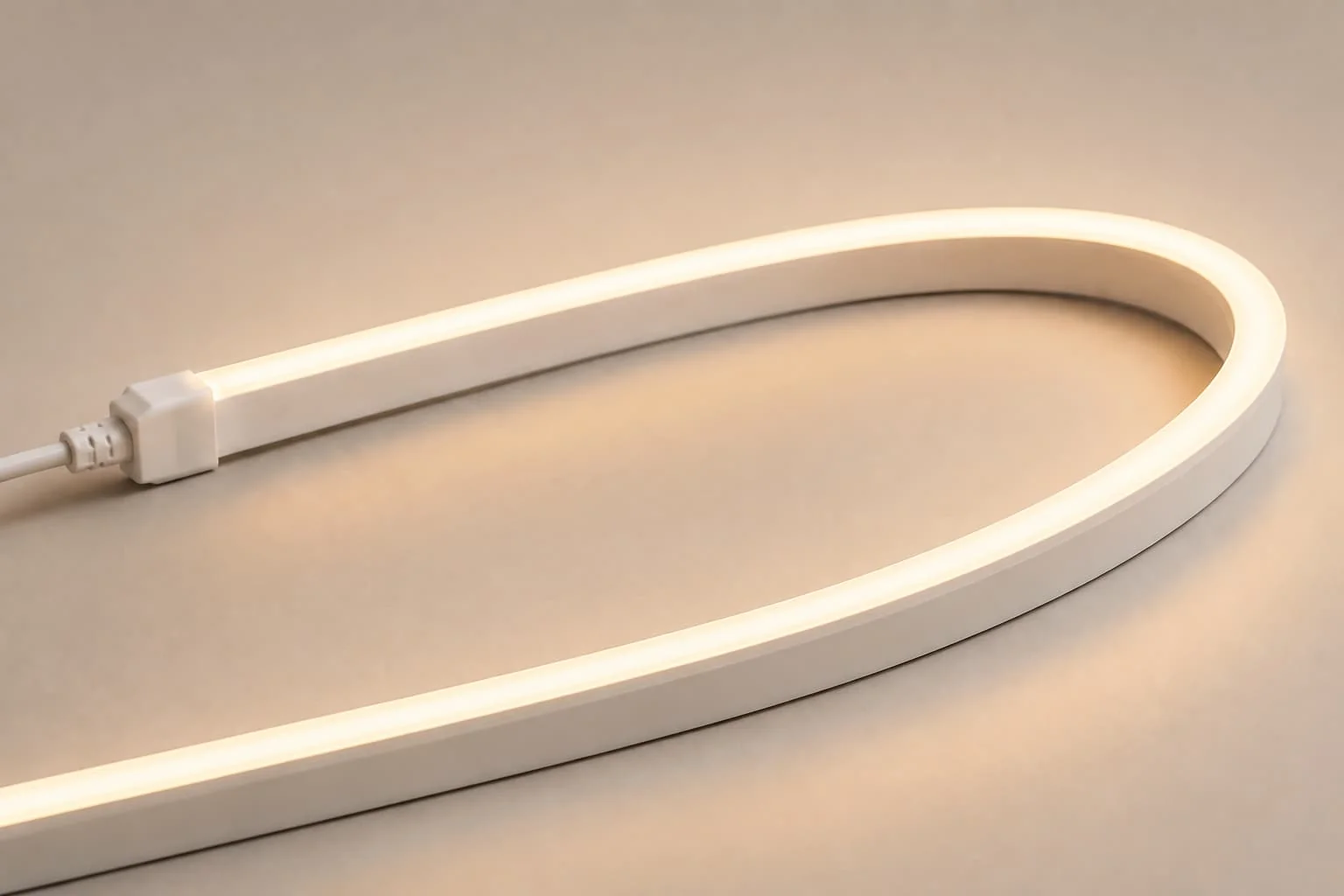 Warm-white LED neon flex curved across a neutral surface
